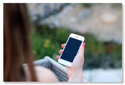 picture of a lady holding a smartphone